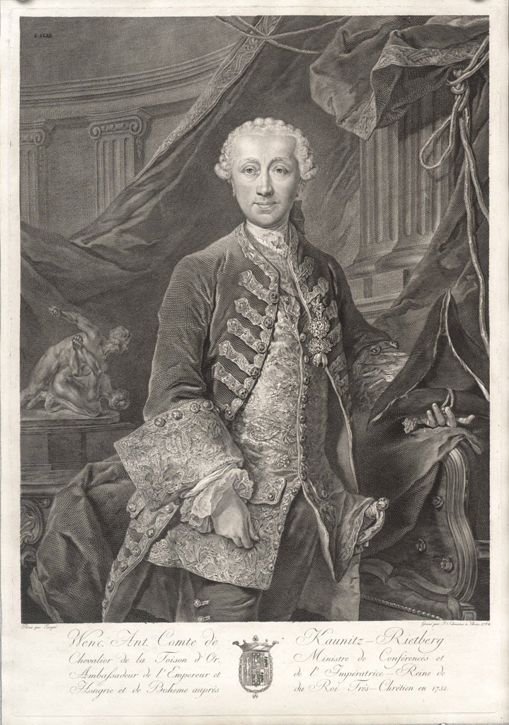 DG_1625 The copper engraving shows the portrait of the standing, nobly dressed State Chancellor Wenzel Anton Prince Kaunitz-Rietberg. He wears a lavishly ornamented jacket and velvet trousers under a richly embroidered collarless coat jacket with large wide cuffs. The frilled collar, a so-called jabot, is tucked into his jacket. On his head he wears a white wig with a centre parting and tight curls at the sides. In his right hand he holds a three-pointed hat sticking upwards. The prince stands in front of a semi-circular wall decorated with antique pilasters and cornices. The largest part of the background is taken up by a broad swathe of fabric. At the bottom of the picture is an inscription extended over four lines, divided in the middle by an emblem. The writing is fine and curved, but too small to read.